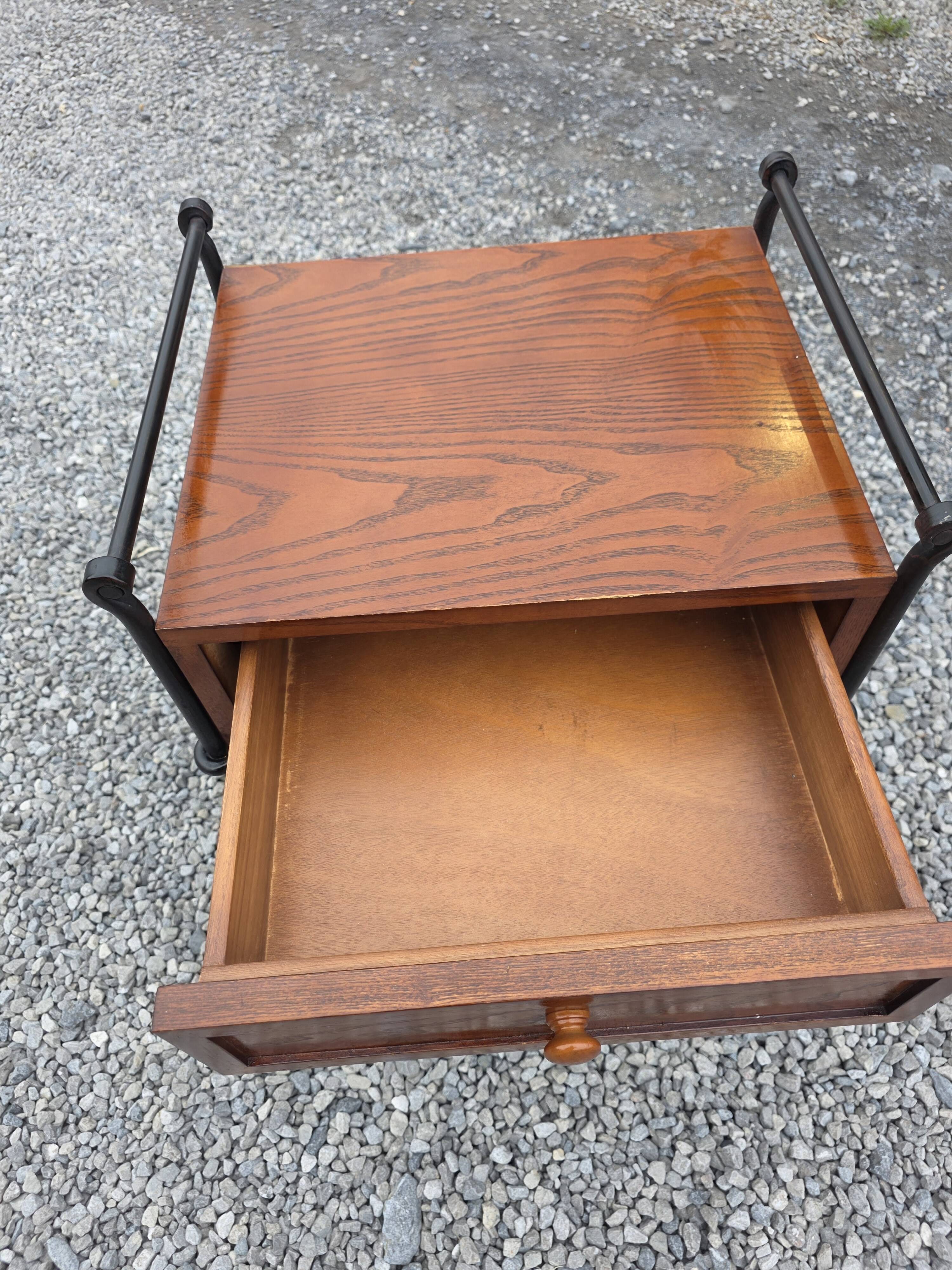 Vintage bedside table in solid oak and wrought iron.