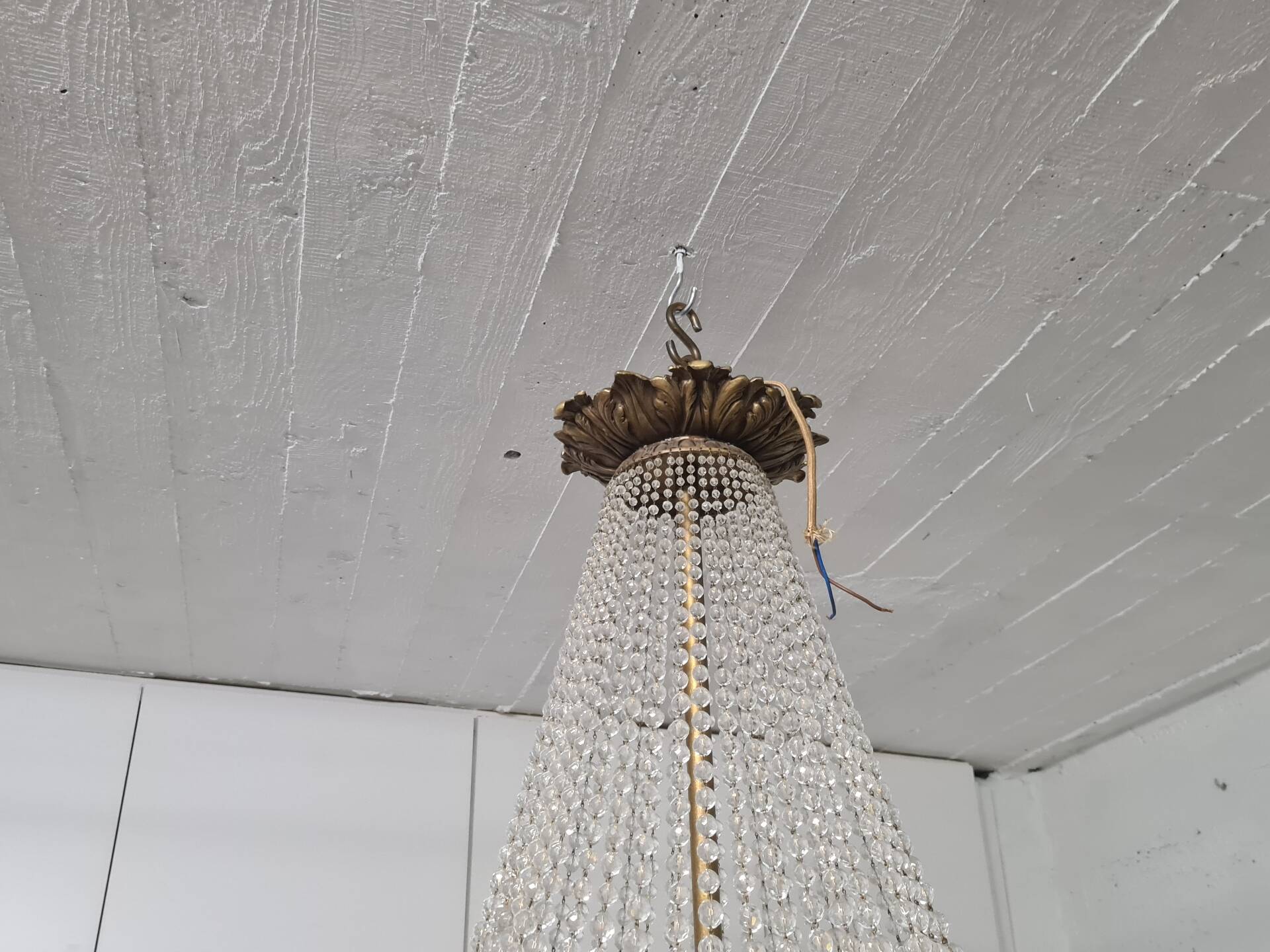 Large chandelier from the late 19th century in crystal and bronze.
