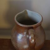Vintage stoneware carafe pitcher with glazed interior