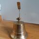 Wall entrance bell with bracket
