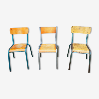 Set of three deparaillé school chairs