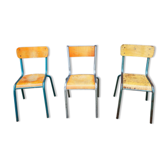 Set of three deparaillé school chairs