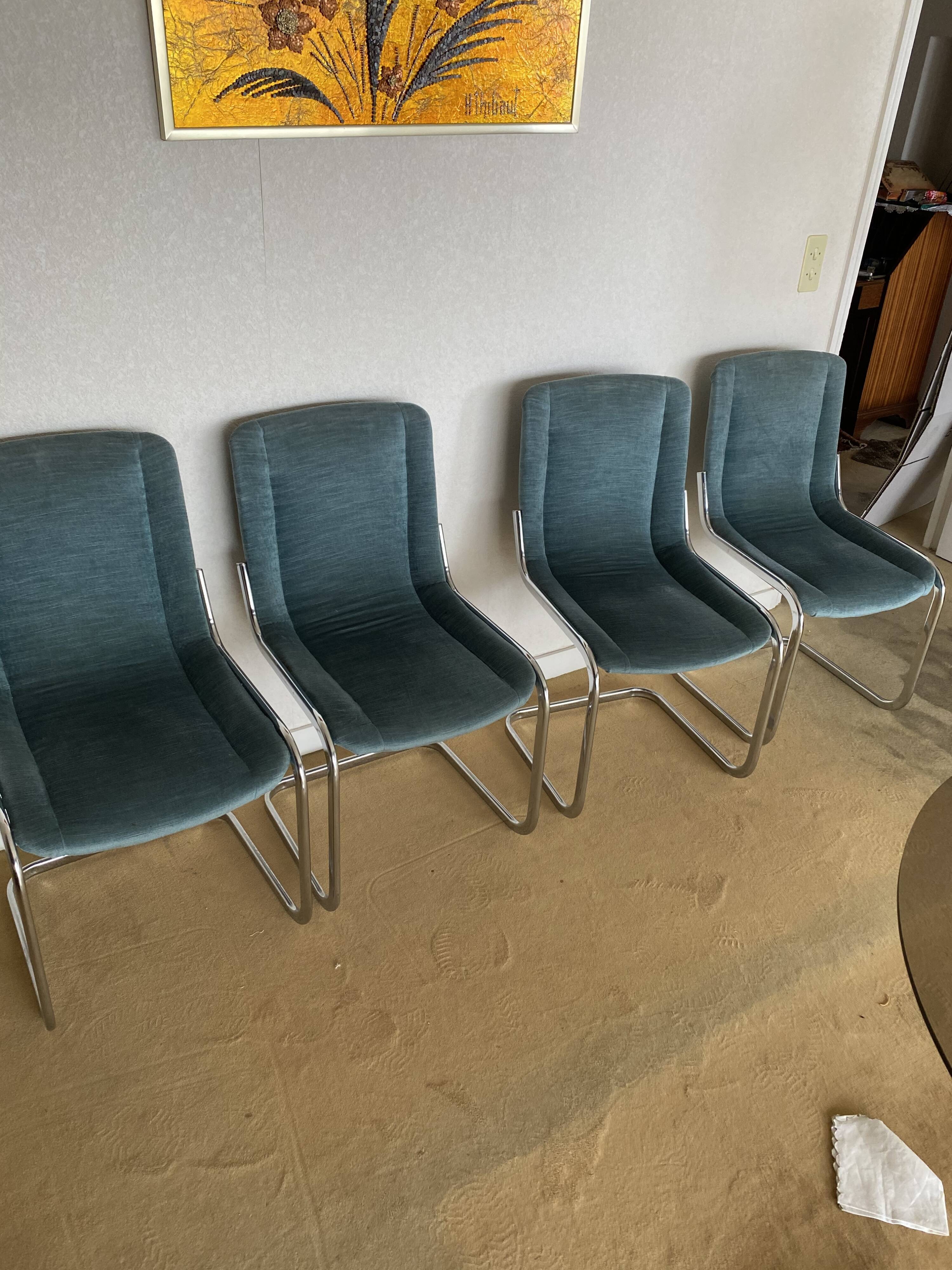 Set 4 steel design chairs and fabrics