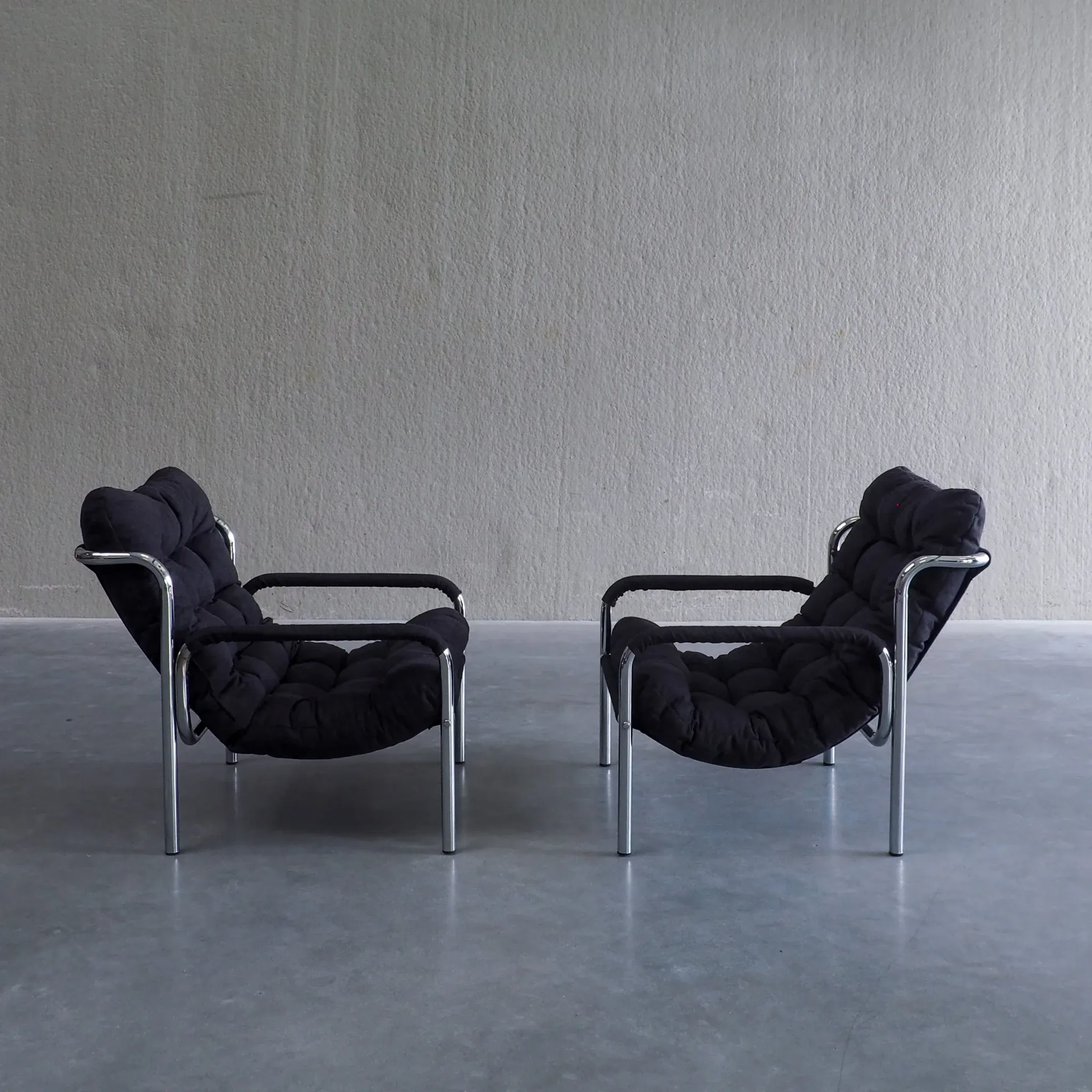 Pair of mid-century modern tubular lounge chairs