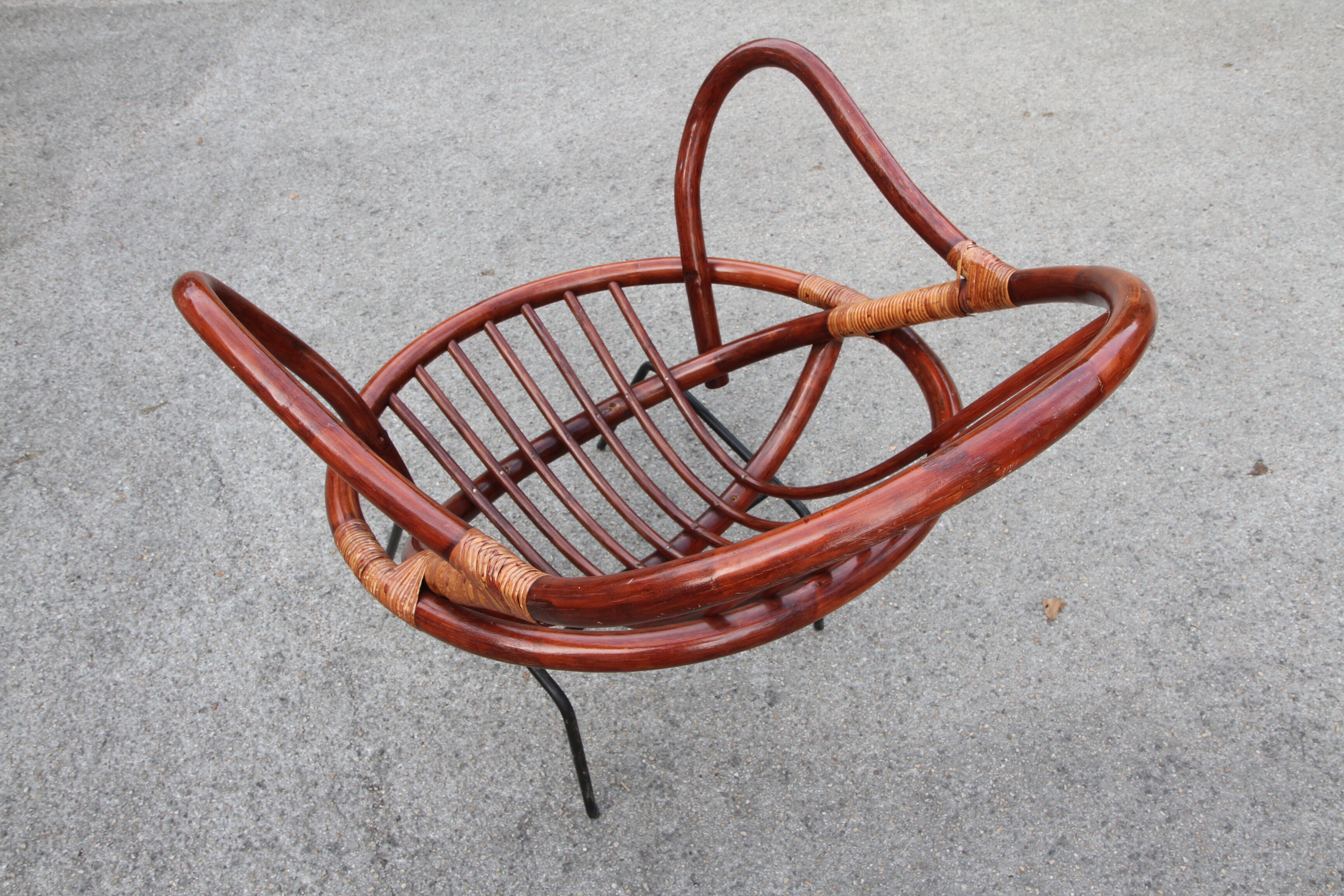 Rattan shell armchair with metal feet