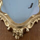 Miroir rocaille en bois doré
