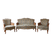 Louis XV style living room set with a sofa and 2 armchairs in cherry wood and fabric.