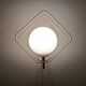 Metal applique with 80s glass sphere