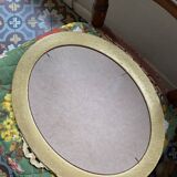 Oval mirror in gilded wood with knot, 32x37 cm