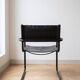 Vintage Bauhaus style cantilever armchair in black metal and leather.