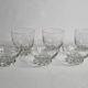 Set of Art Deco style engraved crystal bowls and glasses on spherical feet