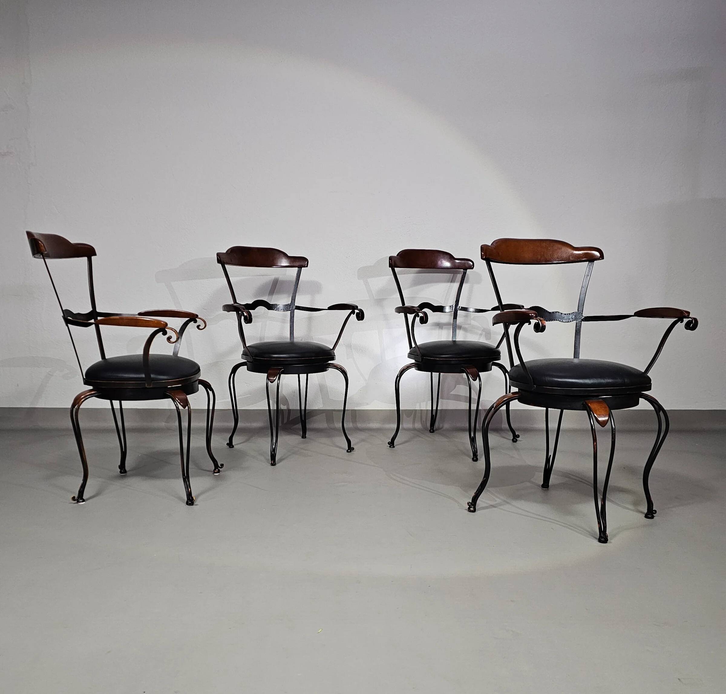 Italian postmodern turnable wrought iron dining chairs with leather seats
