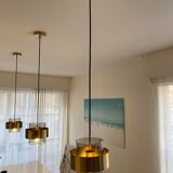 Brass and glass suspensions