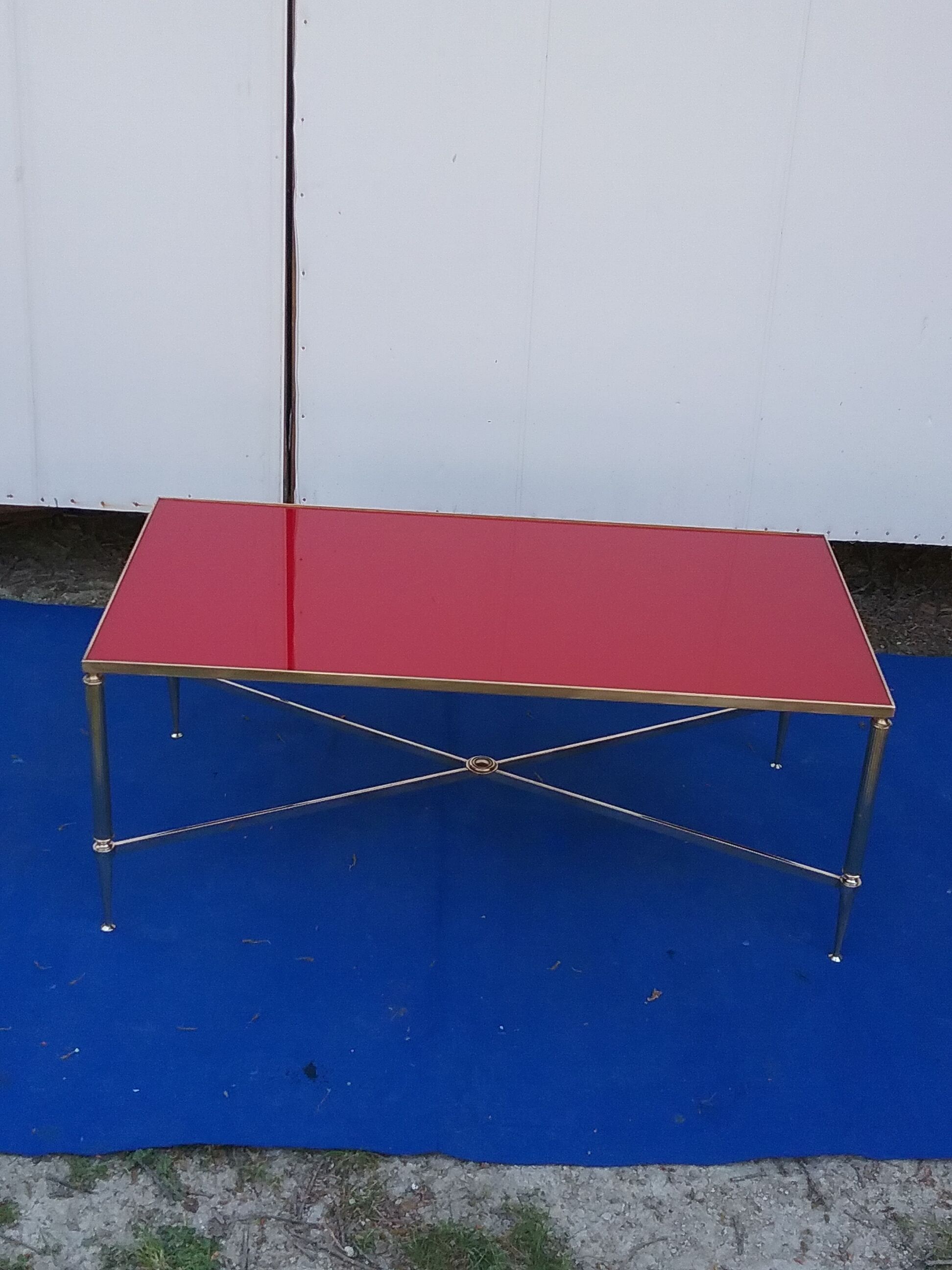 Brass coffee table with red glass top