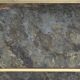 Marble glass coffee table with "solar eruption" decor.