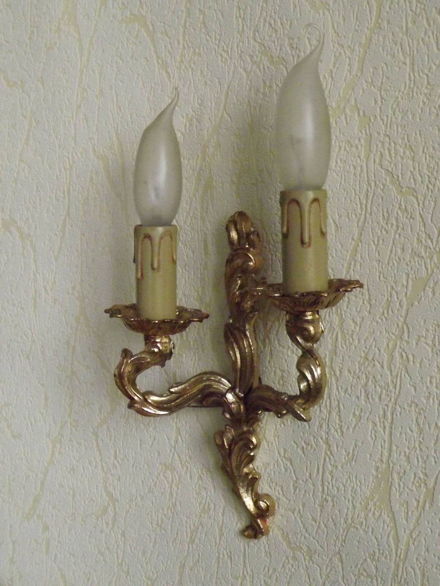 Brass wall lights.