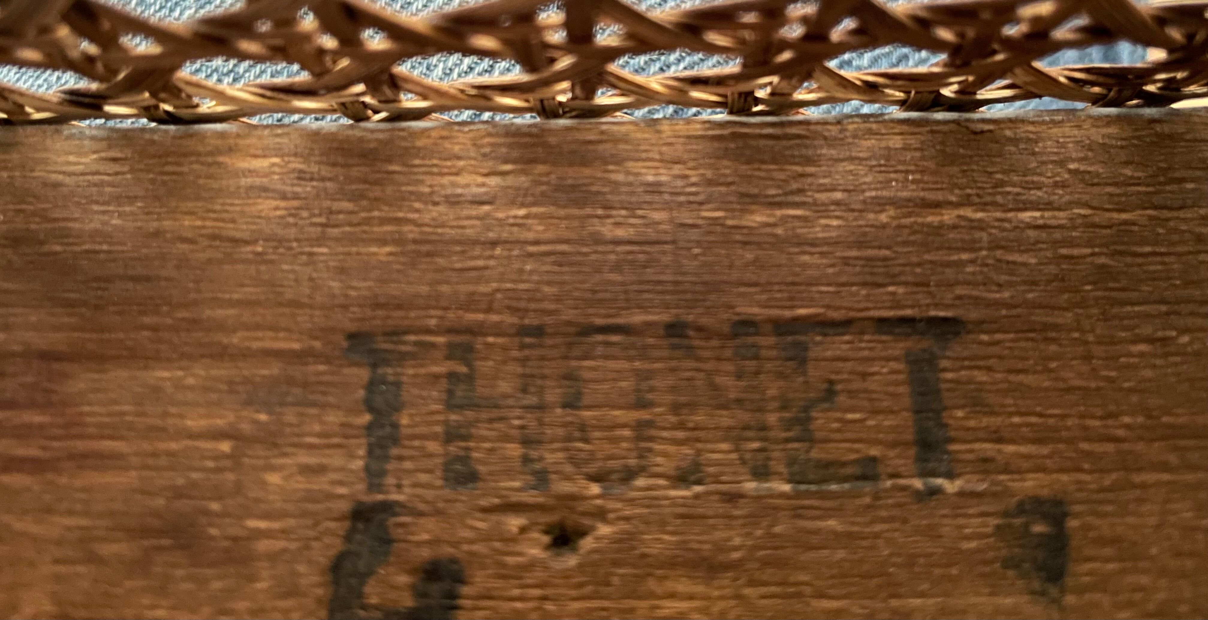 Old thonet armchair in curved wood and rattan cane