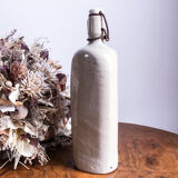 Triangular sandstone bottle
