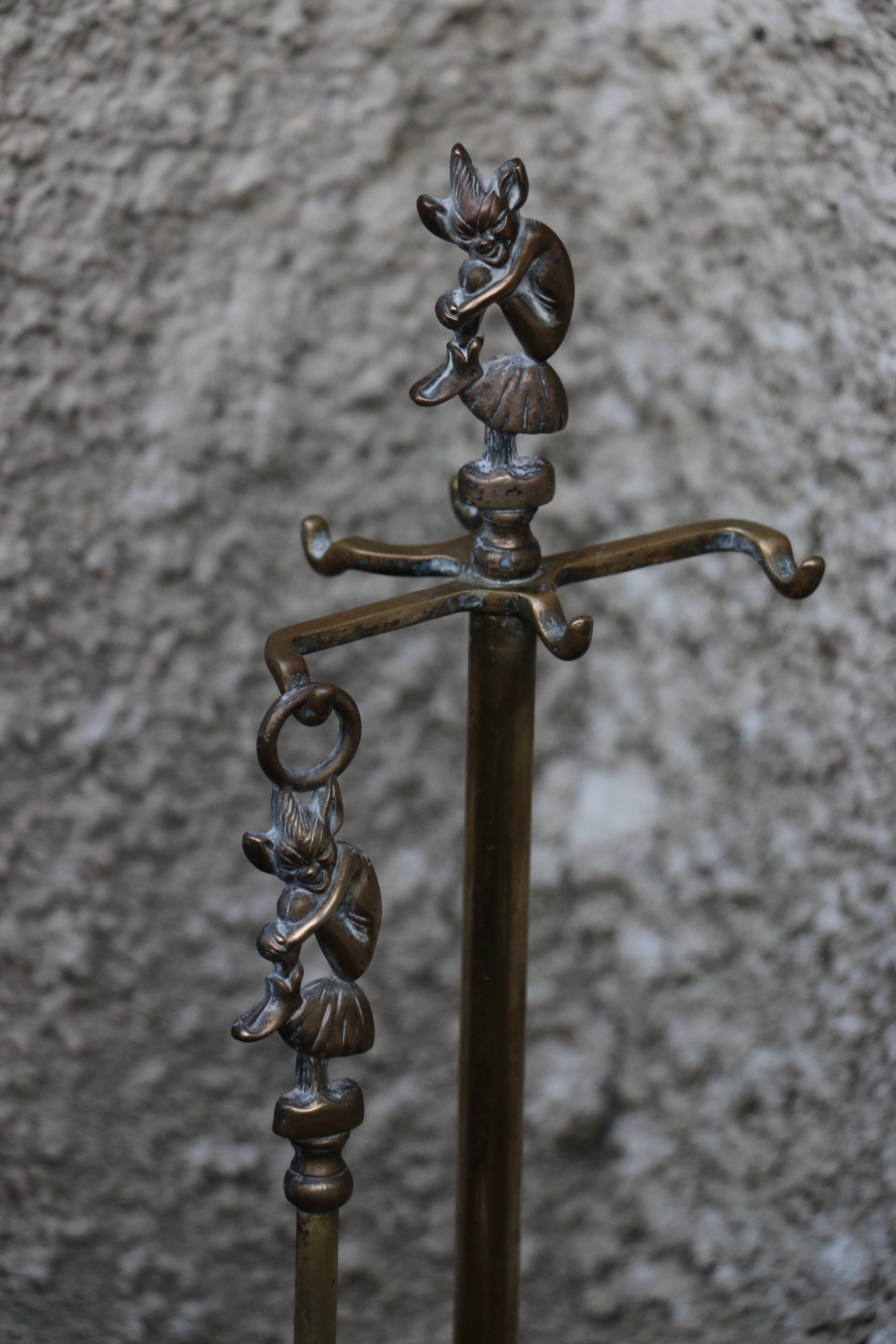 Brass fireplace servant with pair of cast iron pegs with vintage brass ball year 60