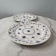 Set of 2 flat plates in English earthenware with blue floral decoration.