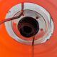 Suspension drop-and-rise in orange opaline from the 1970s.