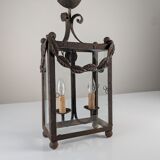 Wrought iron lantern with glass panels, leaf motifs