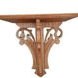 Openwork wooden wall shelf