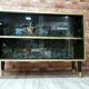 Display case, 1970s Poland, renovated. Black and gold.