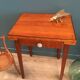 Art Deco 1940 side table compass feet