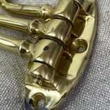 Coat hook with three-pronged folding hooks in brass