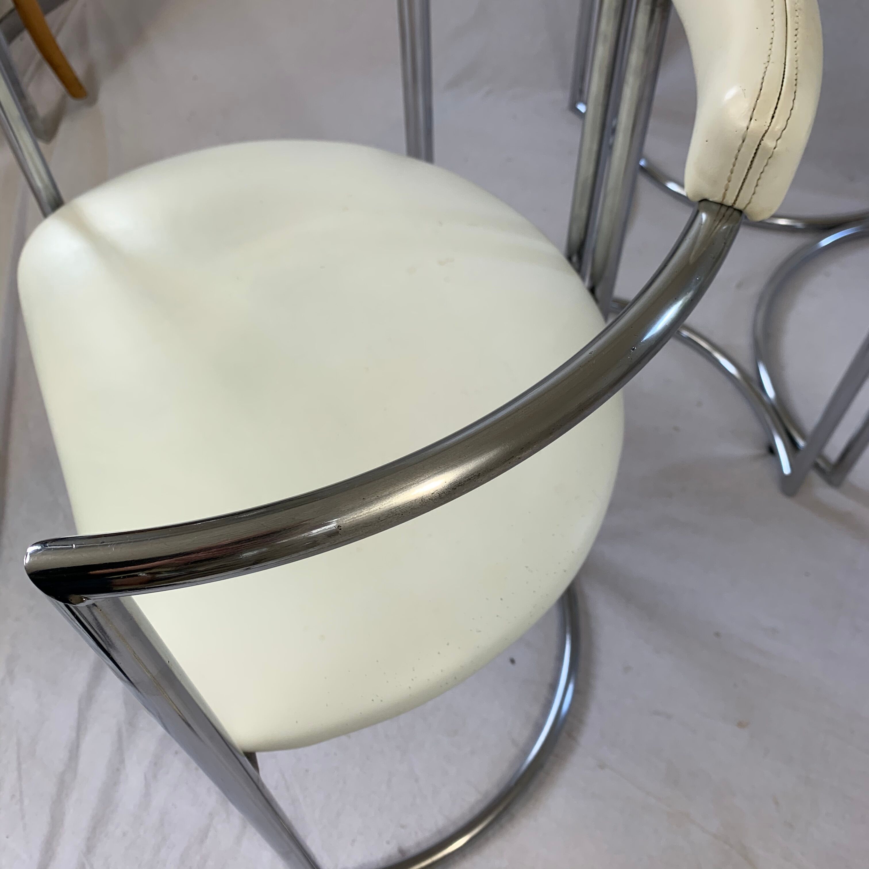 Chrome table and two modernist chairs