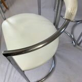 Chrome table and two modernist chairs
