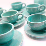 Set of 6 cups in turquoise blue enamelled earth with their saucers and milk jar