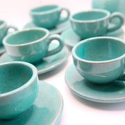 Set of 6 cups in turquoise blue enamelled earth with their saucers and milk jar