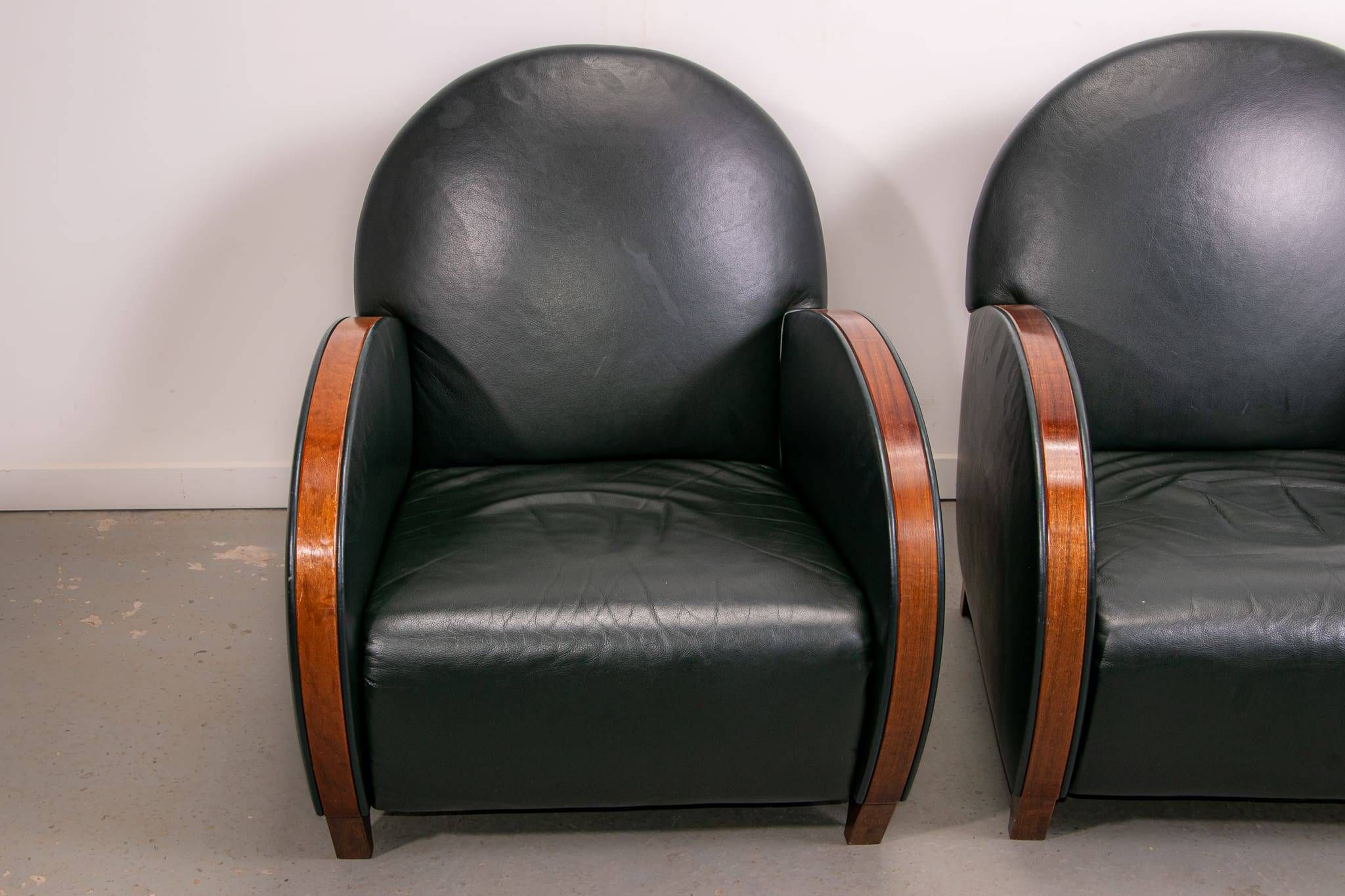 Pair of mid-century leather armchairs, circa 1970, made in Belgium.