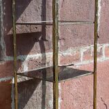 Shelf with gold metal structure