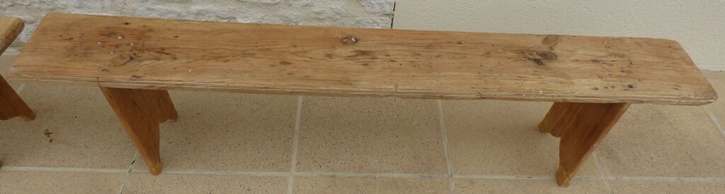 Two benches in their solid wood patinas