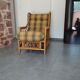 Vintage armchair in bamboo and rattan with a tartan pattern.