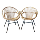 Paire de fauteuils corbeille en rotin - vers 1960.
