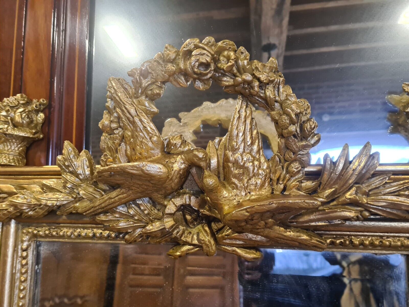 Golden mirror with doves
