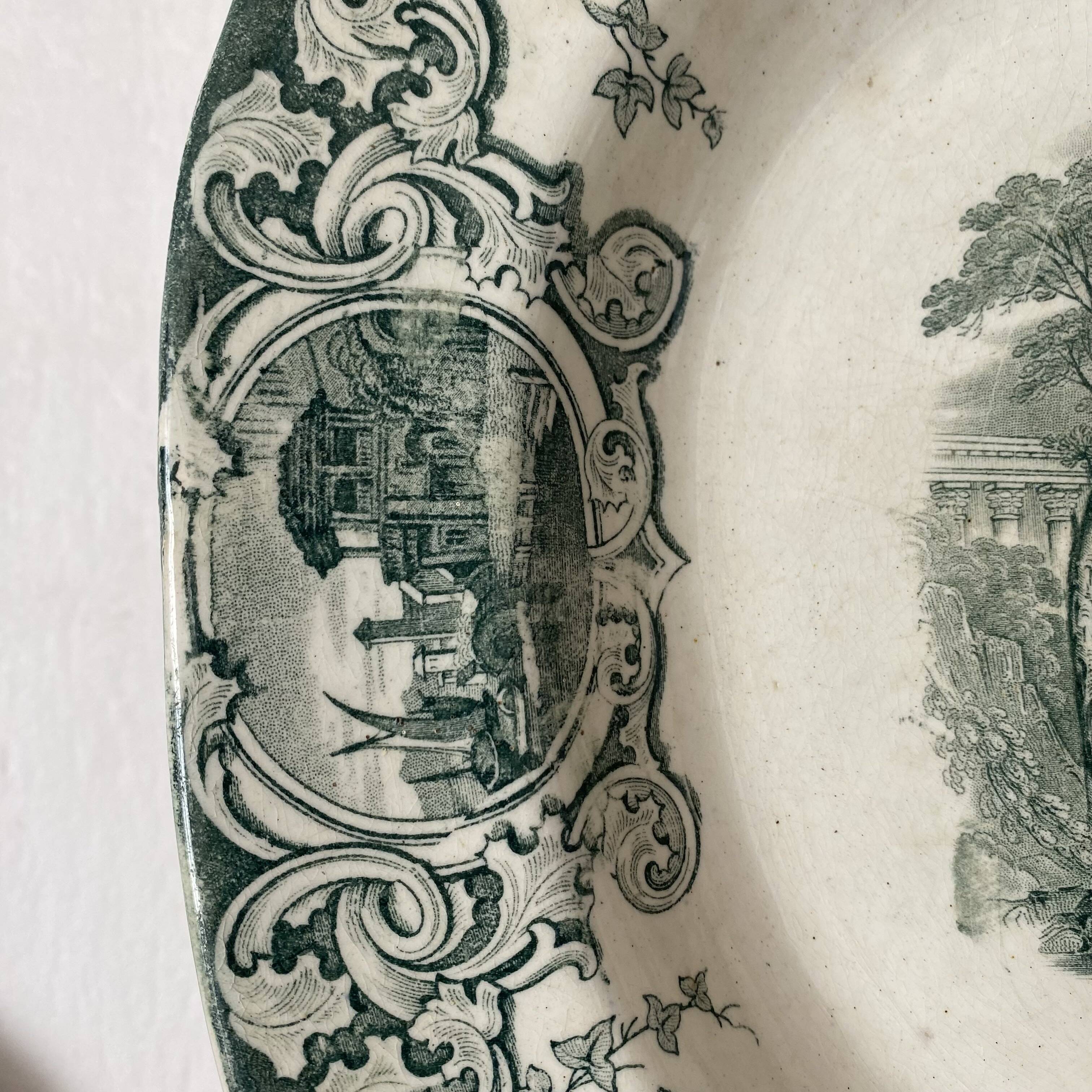Ironware plate with antique decoration