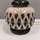 Table lamp in ceramic with a delicate expression. 1970-80s Denmark
