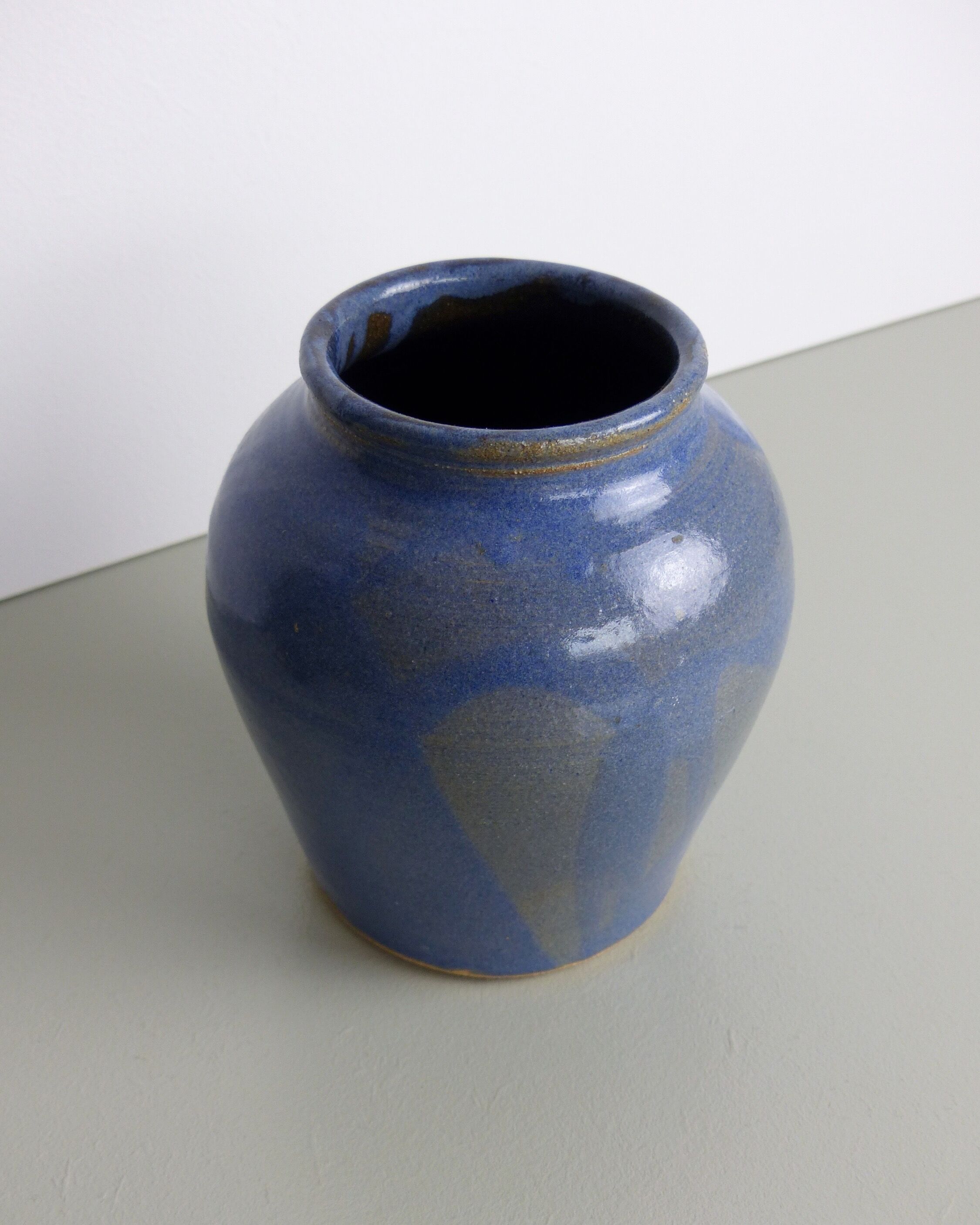 Blue and beige ceramic vase signed