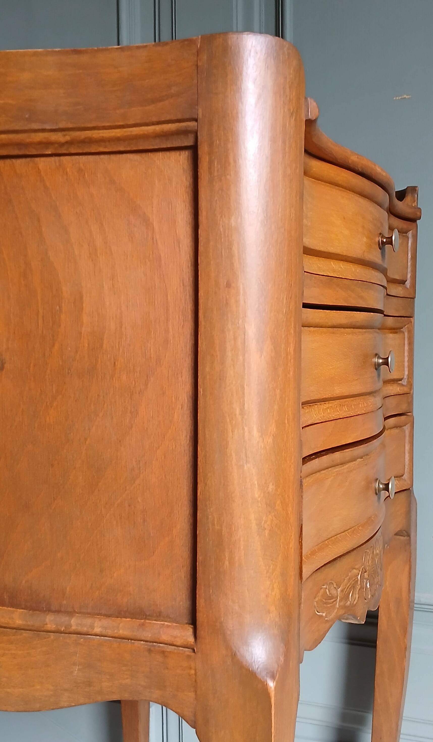 Curved fruitwood chiffonnier in Louis XV style.