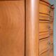 Curved fruitwood chiffonnier in Louis XV style.