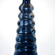 Vintage bottle in moulded glass
