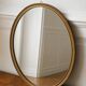 Gold oval mirror - mercury glass
