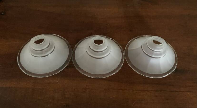 Three glass lampshades