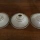 Three glass lampshades