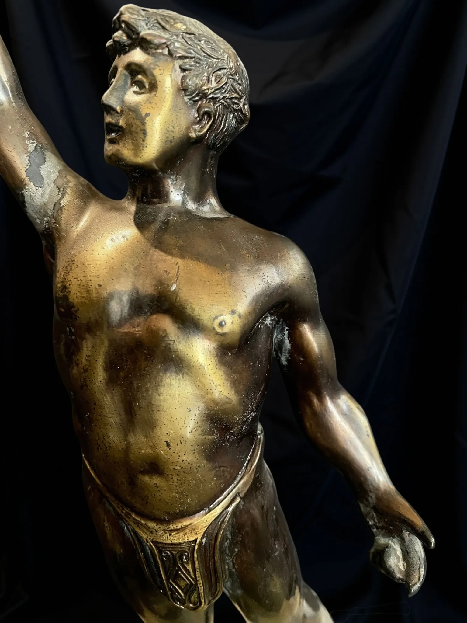 Antique bronze sculpture on a marble base, Roaring Twenties, around 1930.